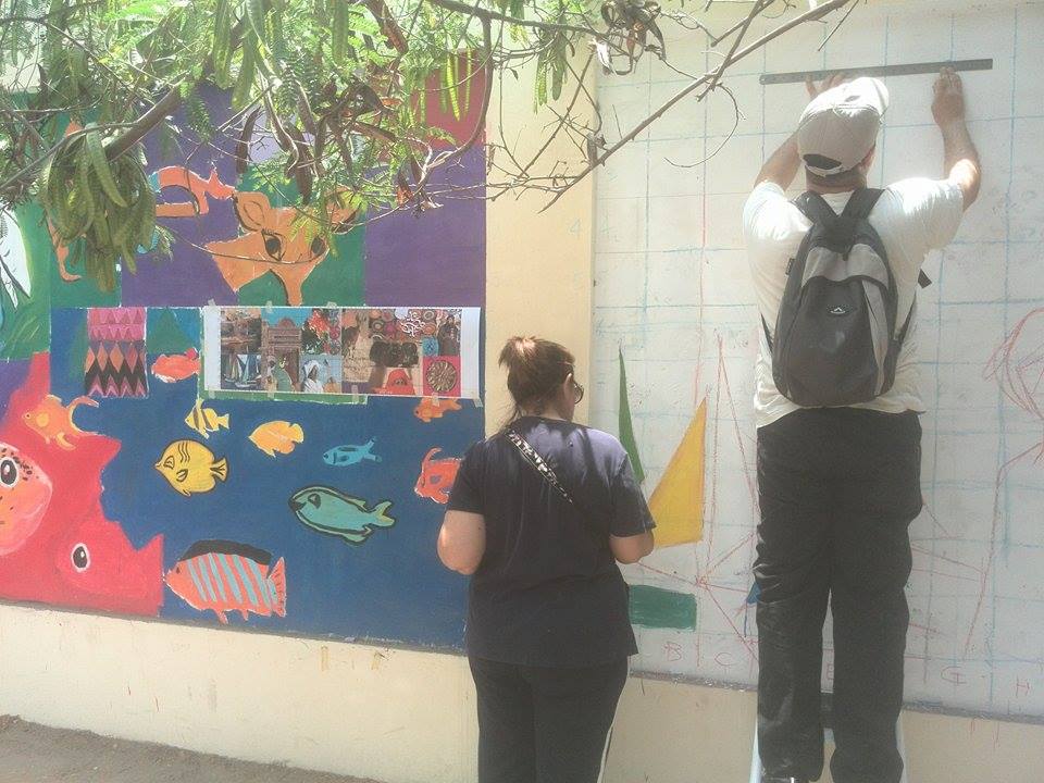 السكان يخططون ويرسمون جدارية لتجميل المنطقة -اليوم السابع -5 -2015